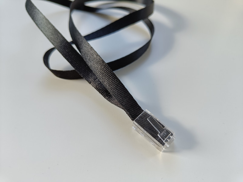 A black lanyard with an RJ45 connector